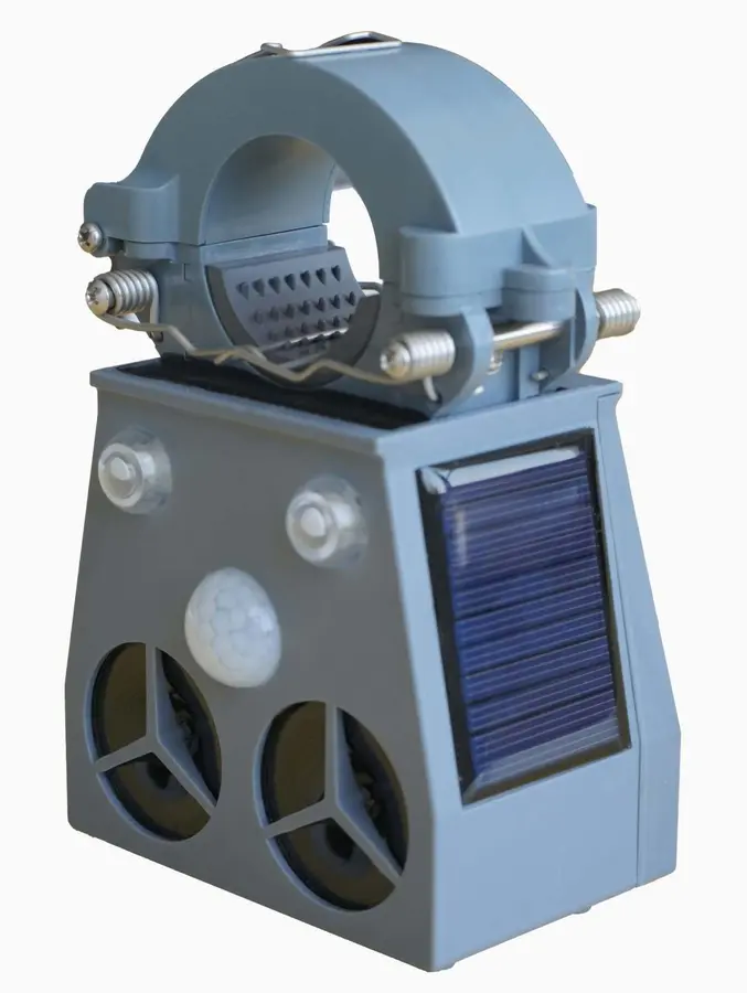 Line-powered bird deterrent with CT harvesting clamp and solar panel